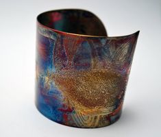 Etched copper hedgehog cuff bangle - etched copper cuff - wild animal design - copper bangle This etched copper hedgehogcuff bracelet has been heat treated to create a vibrant multicoloured patina: this will deepen over time. I have developed a technique of literally 'painting' with a flame to manipulate the shape and direction of the colours. Although there is a degree of control, each piece is unique, as the colour patina cannot be replicated exactly. In holistic medicine, copper claims to hav Copper Cuff Bracelet Wearable Art Gift, Bronze Wearable Art Cuff Bracelet As Gift, Artistic Patina Cuff Bracelet As Gift, Artistic Patina Cuff Bracelet Gift, Unique Patina Bangle As Gift, Hedgehog Gifts, Etched Copper, Hedgehog Art, Copper Cuff