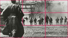 a group of people walking across a dirt field