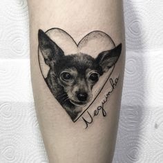 a small dog with a heart shaped photo on its leg that says i love you