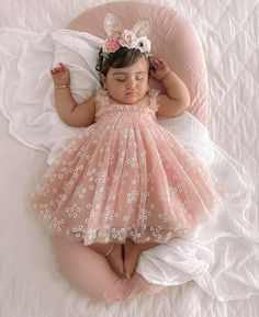 Our Pink Daisy Dress is the perfect party outfit for your little love and will certainly make them feel like a princess. They are made with layered quality tulle with a cotton underlay.  Match this Dress with any of our Flower Crowns or Birthday accessories.  Material: Cotton, Tulle Handwash is highly recommended Cute Sleeveless Tulle Tutu Dress, Cute White Princess Dress For First Birthday, Sweet White Princess Dress For First Birthday, White Tulle Sweet Dress, Sweet White Tulle Dress, Cute Summer Princess Dress For First Birthday, Playful White Tulle Princess Dress, Playful Tulle Tutu Dress For Birthday, Sweet Tulle Princess Dress For Birthday