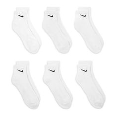 The Nike Everyday Cushioned Quarter Socks feature a ribbed arch band for a snug fit for everyday adventures. The thick terry sole provides comfort and impact absorption for your workouts, and the sweat-wicking fabric keeps your feet dry and comfortable. The straightforward Nike Swoosh on the upper adds a sporty look. Quarter design covers ankle. Dri-FIT technology keeps your feet dry. Reinforced heel and toe for durability. Arch compression offers a snug, breathable fit. Fabric: 71% cotton, 26% White Nike Crew Socks, Nike Quarter Socks, Womens Nike Socks, Clothes Christmas List, Ankle Nike Socks, Short Nike Socks, Nike Socks Ankle, Things To Add To Your Wishlist, Nike White Socks