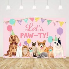 there are many dogs and cats in this party photobooting booth that says let's paw - ty