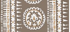 an image of a decorative wallpaper with circles and dots in brown and white colors