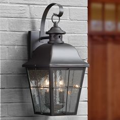 With simple details and traditional style the Millhouse outdoor collection is perfect for understated elegant lighting. The design features clear seedy glass that diffuses the light in a soft tranquil way and the rich Mystic Black finish completes the look. Quoizel Millhouse 1-Light 15-in H Black Outdoor Wall Light | MHE8406K Black Candelabra, Front Door Lighting, Driveway Ideas, Outdoor Wall Mounted Lighting, Black Outdoor Wall Lights, Lantern Post, Garage Lighting, Outdoor Wall Lantern, Traditional Lighting