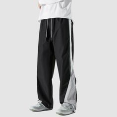 Material: 100% PolyesterFeatures: Pants, cargo pants, parachute pants, wide legs, slightly stretchy, drawstring waist, color contrast, straight-leg, relaxed fit, unisex, couple outfits.Style: Casual, college, streetwear Streetwear Straight Cargo Pants With Drawstring, Black Straight Leg Sweatpants For Outdoor, Streetwear Cargo Pants With Drawstring, Black Wide Leg Hip Hop Joggers, Streetwear Straight Leg Pants With Contrast Color, Casual Cotton Sweatpants With Contrast Color, Straight Leg Pants With Contrast Color For Streetwear, Black Cargo Sweatpants For Spring, Streetwear Bottoms With Contrast Color And Long Pants