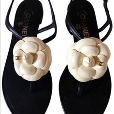 %Authentic Chanel Classic Black Leather Ankle Strap Sandals With Delicate Cream Calfskin Leather Camellia Flower Adorned With Gold Tone Cc Logo At Camellia. A Must Have. Gold Tone Buckle Closure With Chanel Logo At Buckle. Gently Worn. Chanel Blush, Chanel Flats, Chanel Camellia, Fashion Shoes Flats, Flower Sandals, Jeweled Sandals, Chanel Sandals, Camellia Flower, Fashion Slippers