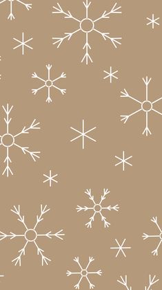 snowflakes on a brown background are drawn in white ink and have been added to the pattern