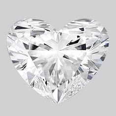 a heart shaped diamond on a gray background