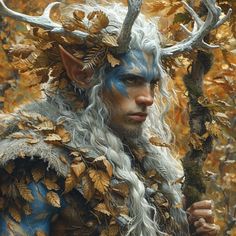 a man with long white hair and blue eyes is dressed up as an elf in the woods