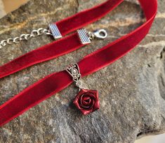 Velvet ribbon choker with sculpted flower. Material of rose is polymer clay. Each petal of flower made by hand Dia flower about 15 mm/ 0.55 " Length of necklace is adjustable: 10-12 inches/ 25,4 - 30,5 cm 11-13 inches/ 28-33 cm 12-14 inches/ 30.5- 35.5 cm 13-15 inches/ 33-38 cm 14-16 inches/ 35.5 cm-40.5 cm 15-17 inches/ 38,1 cm- 43,2 cm 16-18 inches/ 40.6 cm- 45.7 cm 17-19 inches/ 43 cm - 48 cm 18-20 inches/ 45,5- 50.8 cm Width of ribbon 10 mm / 0.4 inch Polymer clay isn't afraid of water, stro Flower Charm Choker As A Gift, Rose Design Choker Jewelry For Gift, Red Choker For Valentine's Day Gift, Floral Choker With Flower Charm As A Gift, Elegant Rose Design Choker As Gift, Adjustable Flower Pendant Choker For Gift, Adjustable Flower Pendant Choker Gift, Rose Design Choker Jewelry Gift, Flower Shaped Choker With Flower Charm As Gift