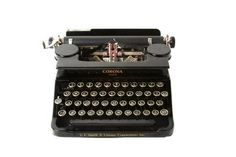 an old fashioned black typewriter on a white background