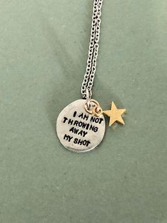 Show your love of Hamilton with this hand stamped necklace. The circle charm is made of pewter and are approximately 3/4 inch in diameter. The charms are base metal. The chains are 20 inches long and are made of stainless steel.  The necklaces come ready to give, packaged in a hand-stamped brown cardboard box. View more items in my shop:  http://www.etsy.com/shop/dustlily Hamilton Schuyler Sisters, Hamilton Jewelry, Hamilton Memes, Xmas Wishes, Stamped Bracelet, Hand Stamped Necklace, Couple Jewelry, 12th Birthday, Newsies