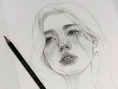 a pencil drawing of a woman's face