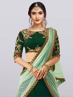 Showcase your best ethnic look with this mesmeric "dark green embroidered taffeta silk bridal lehenga choli" for women. Crafted from exquisite green color taffeta silk material, this lehenga exudes elegance and grace. The intricate dori work, zari work, and thread embroidery add a touch of opulence, making it a perfect choice for weddings, engagements, ethnic wear, evening events, and other special occasions.
The set includes a beautiful lehenga, a choli, and a net dupatta, all adorned with matc Green Saree Set With Intricate Embroidery, Semi-stitched Green Embroidered Fabric, Green Raw Silk Choli With Intricate Embroidery, Green Art Silk Anarkali Set With Intricate Embroidery, Embroidered Green Raw Silk Lehenga, Green Chanderi Choli With Intricate Embroidery, Green Embroidered Raw Silk Lehenga, Green Art Silk Choli With Intricate Embroidery, Green Organza Lehenga For Reception