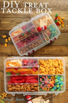 the diy treat box is filled with candy, candies and crackers in it