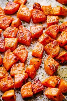 cooked sweet potatoes with parmesan cheese and seasoning