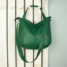 ankateBAGS: green leather bag custom cross shoulder bag for women crossbody slouch bag green crossbody bag large leather work tote bag hippie cross bag This green vegan leather tote for women can be your daily use purse, large cross shoulder bag, business work bag or slouch hippie hobo crossbody. It's universal bag, that fits well with all different kinds of outfits and occasions. Durable, easy to pack and clean, large and roomy enough for all your items on the go. Lining with 3 pockets, whole bag is fastened with zipper.  DETAILS (shown): color: dark green pattern: 3in1 bag size: (L) arge width: 31-35 cm + 8 cm sides and bottom/ 12-14 in + 3 in sides and bottom height: 35 cm / 14 in  - done very carefully, - aesthetic finish,  - fastened with zipper, - long adjustable strap (65- 125 cm/25 Leather Work Tote, Cross Shoulder Bags, Slouch Bags, Work Tote Bag, Hobo Crossbody Bag, Vegan Leather Tote, Beige Bag, Bag Green, Crossbody Tote Bag