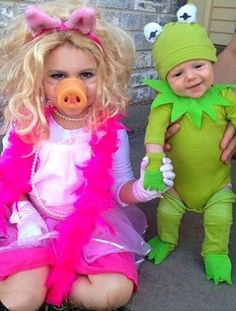 two children dressed up in costumes for halloween