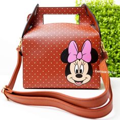 Add A Touch Of Disney Magic To Your Wardrobe With This Minnie Mouse Purse! Measures About 8" Wide And 9.5" Tall (Not Measuring The Straps) 4" Deep. The Box Shape And Faux Leather Material Make It A Stylish And Durable Choice. Perfect For Fans Of The Iconic Character, Can Hold All Your Daily Essentials. Whether You're Headed To The D23 Expo Or Just Running Errands, This Purse Is A Must-Have Accessory. This Disney Minnie Mouse Purse Is Brand New And Unmodified, Making It A Great Gift For Any Colle Disney Style Rectangular Shoulder Bag For School, Disney Style Gift Bag, Rectangular Shape, Cute Rectangular Minnie Mouse Bags, Trendy Rectangular Bags For Disney Trips, Minnie Mouse Purse, Disney Bag, Leather Box, Purse Bag, Disney Magic