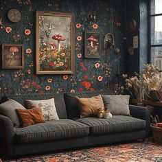 a living room filled with furniture and paintings on the wall