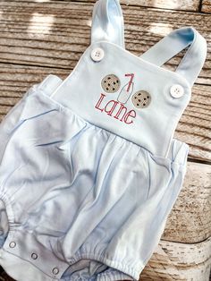 Monogrammed boys cross backed bubble in baby blue with cookies and milk design.  Boys Sunsuit is perfect for cookie themed 1st birthday outfit, or cake smash outfit.    Available in 3M, 6M, 9M, 12M, 18M, 2T, and 3T. These bubbles run about a size big.  Message me with questions. Alternate design boys bubbles available in my shop.  Please inquire about adding a different theme to this romper.  Coordinating girls ruffle bubble here: https://www.etsy.com/SweetAndStitched/listing/680330097 In Notes One Sweet Boy Birthday Theme, First Birthday Boy, Baby Boy Monogram, First Birthday Cookies, Boys 1st Birthday Party Ideas, 1st Birthday Shirts, Birthday Themes For Boys, 1st Birthday Themes