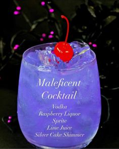 a purple cocktail with a cherry on top