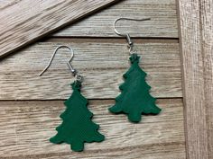 Christmas Tree 3D printed earrings -  It is 3D printed from a high quality PLA material, which feels like a light plastic but is very durable. Metal part of earring is silver plated and nickel-free. 3d Printed Earrings Christmas, 3d Printed Earring, 3d Printed Christmas Earrings, 3d Printed Earrings, Printed Earrings, 3d Printing Diy, 3d Printed Jewelry, Christmas Tree Earrings, Print Ideas