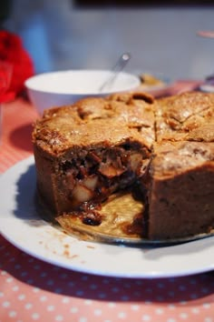 a piece of pie on a white plate