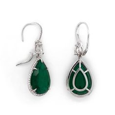 Handcrafted drop dangling platinum earrings with large pear cut green emeralds 26.82 ct in total from Zambia. Green emerald stones are Certified. Pear cut white diamonds are 0.68 ct in total. Smaller accent round diamonds are 2.0 ct in total. Diamonds are all natural and white in G-H Color Clarity VS. Lever back earrings. Width: 1.5 cm Height: 4.5 cm Weight: 17.5 g Luxury Pear-shaped Emerald Earrings, Luxury Green Teardrop Earrings, Green Teardrop Diamond Earrings Fine Jewelry, Green Teardrop Diamond Earrings, Pear-shaped Emerald Green Earrings, Formal Green Teardrop Gemstone Earrings, Green Pear-shaped Teardrop Earrings For Formal Occasions, Green Teardrop Earrings With Prong Setting, Formal Green Sterling Silver Teardrop Earrings