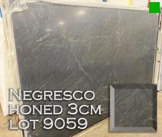 black marble tile with the words negresso honed 3cm lot 909