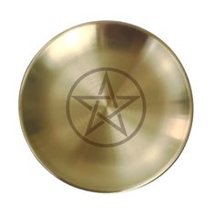 a brass plate with a pentagram star on it