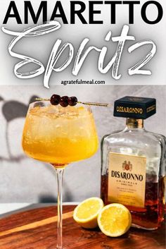 an image of a drink with lemons on the side and text that reads amaretto spirit