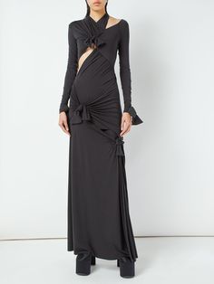 Find BALENCIAGA Stretch Jersey Knot Gown on Editorialist. Pull on. Knot details. Front, side and back cutout details. Model is wearing a size40 Black Tie Aesthetic, Tie Aesthetic, Cutout Gown, Jersey Turtleneck, Black Balenciaga, Balenciaga Women, Balenciaga Black, Dress Home, Womens Black Dress