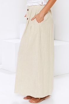 Beige Buttoned Maxi Skirt Beach Skirt With Pockets And Wide Leg, Beige Lined Maxi Skirt For Day Out, Wide Leg Beach Skirt With Pockets, Casual Neutral Midi Skirt, Chic Beige High-waist Maxi Skirt, Chic High-waist Beige Maxi Skirt, Chic Beige High Waist Maxi Skirt, Beach Long Skirt With Pockets, Relaxed Neutral Maxi Skirt