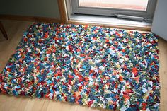 an area rug is on the floor in front of a window