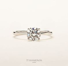 an engagement ring with a diamond in the center