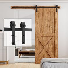 the sliding barn door is open and ready to be used as a bed room divider