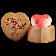 a heart shaped wooden box with two hearts in it and the words dear mum engraved on top