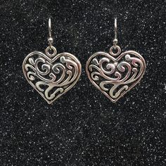 You'll look elegant in these minimalist silver filigree heart dangling earrings. Lovely and lightweight, these earrings can be worn anytime, with anything. Perfect for any occasion. from romantic to casual.   Hypoallergenic ear wires (nickel and lead free). Choose ear wire style at checkout. Elegant Nickel-free Open Heart Earrings, Elegant Heart-shaped Nickel-free Earrings, Elegant Metal Heart Earrings With Ear Wire, Nickel-free Open Heart Metal Earrings, Heart-shaped Filigree Earrings For Gift, Hypoallergenic Heart Drop Earrings, Pierced Metal Earrings Open Heart Shape, Prom Jewelry Earrings, Silver Heart Earrings