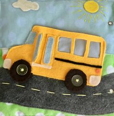 a yellow school bus is on the road