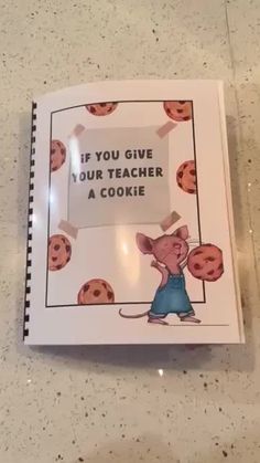 a book with an image of a mouse and cookies on the cover that says, if you give your teacher a cookie