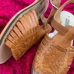 Experience the authentic craftsmanship of Mexico with our handmade Huaraches, skillfully crafted by Mexican artisans 🌞 For the perfect fit, we recommend selecting a size down if you wear a half size (e.g., if you typically wear 8.5, choose size 8). Our Huaraches feature premium leather that naturally stretches and molds to your feet over time, ensuring personalized comfort with every step. Discover more styles and join our community on Instagram! Follow @currashop for exclusive updates and insp Casual Natural Huarache Sandals Fair Trade, Artisan Brown Huarache Sandals For The Beach, Artisan Brown Huarache Sandals For Summer, Natural Casual Huarache Sandals For Festivals, Casual Brown Huarache Sandals Fair Trade, Casual Natural Huarache Sandals For Festival, Adjustable Brown Huaraches For Festival, Artisan Brown Huaraches For Summer, Brown Fair Trade Huaraches For Summer