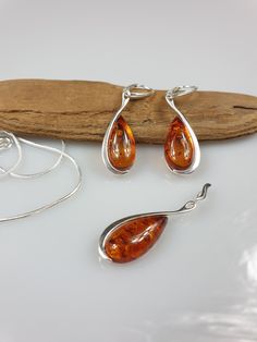 Natural Baltic Amber. Sterling Silver 925. With all hallmarks. Cognac Teardrop Baltic Amber. Big earrings length about 4,5 cm Pendant is also available. When You buy a pendant or a set you will get a free gift - silver plated chain. https://www.etsy.com/shop/AmberLithuania?ref=simple-shop-header-name&listing_id=780205095&section_id=27948198 Amber Drop Jewelry With Matching Earrings, Amber Teardrop Jewelry With Matching Earrings, Amber Teardrop Sterling Silver Jewelry, Amber Sterling Silver Dangle Jewelry, Baltic Amber Dangle Earrings, Amber Sterling Silver Drop Earrings, Amber Sterling Silver Earrings, Earrings Hanging, Multicolor Earrings