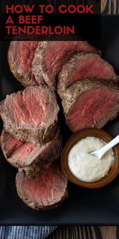 how to cook a beef tenderloin on a black platter with a bowl of ranch dressing