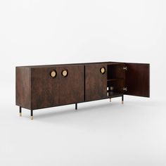 the sideboard is made out of wood and has brass knobs