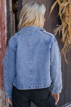 This Double Breasted Denim Jacket features a timeless collared neckline and long sleeves for a classic silhouette! The double-breasted design with functional buttons adds a polished touch. Made from 100% cotton, this jacket ensures all day comfort. A versatile layer that can be styled over casual outfits or dressed up for a chic, modern look. Perfect for pairing with jeans and ankle booties for a laid-back, everyday look. Denim Blue Cotton Utility Jacket For Fall, Light Wash Denim Jacket With Buttoned Pockets For Fall, Medium Wash Casual Outerwear With Lapel Collar, Casual Medium Wash Outerwear With Lapel Collar, Washed Blue Utility Outerwear For Fall, Casual Double-breasted Denim Jacket With Buttons, Light Wash Collared Denim Outerwear, Washed Blue Utility Jacket For Fall, Light Wash Denim Collared Outerwear