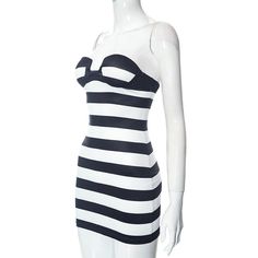 This dress features a strapless design and chest wrap detailing, creating a flattering and modern silhouette. The striped pattern adds a touch of sophistication to the look. - Color: Black- Style: Bodycon- Pattern Type: Stripe- Sleeve Length: Strapless- Length: Mini - Fabric: Polyester- Fit Type: Slim Fit- Occasion: Casual, Party- Gender: Women- Size: S, M, L Striped Fitted Mini Dress With Spaghetti Straps, Striped Mini Dress With Spaghetti Straps, Striped Strapless Dress For Party, Striped Strapless Party Dress, Fitted Strapless Striped Dress, Fitted Striped Dress With Spaghetti Straps, Striped Fitted Dress With Spaghetti Straps, Striped Bodycon Beach Dress, Striped Bodycon Dress For The Beach