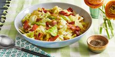 a white bowl filled with cabbage and bacon