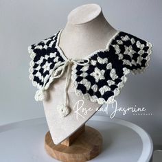 Introducing our one-of-a-kind hand-made crochet granny square collar, created with love and care by our talented artisan, Jasmine. Each collar is unique and made with the highest quality yarn, carefully selected to create a beautiful and durable piece that will last for years to come. The intricate crochet design features classic granny squares, arranged in a delicate pattern that creates a scalloped edge. Every stitch is made by hand, ensuring that each collar is crafted with the utmost attention to detail and precision. It's also a great way to add a pop of colour to your outfit and show off your unique style. Crafted with passion and creativity, our hand-made crochet granny square collar is truly a one-of-a-kind piece that reflects the beauty of traditional artisanal craftsmanship. It's Crochet Yarn Crafts As Gifts, Crochet Yarn Crafts For Gifts, Granny Square Collar, Black White Crochet, Knitting Collar, Granny Stripe, Crochet Unique, Intricate Crochet, Bib Collar