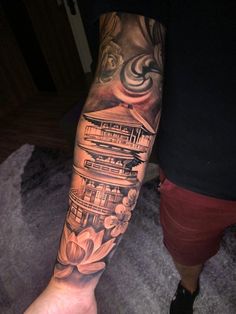 a person with a tattoo on their arm